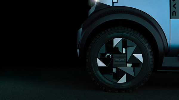Детал од страната на концепт автомобилот Dacia Hipster  со акцент на тркалото и фелните.