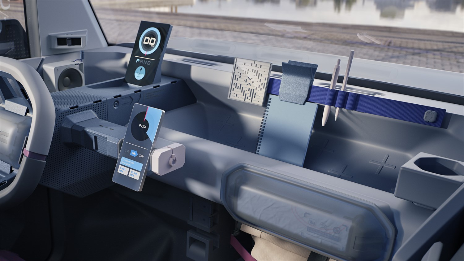 Детал од внатрешноста на концептниот автомобил Dacia Hipster со дигитални екрани, прегради за складирање и практични држачи за тетратки и пенкала.